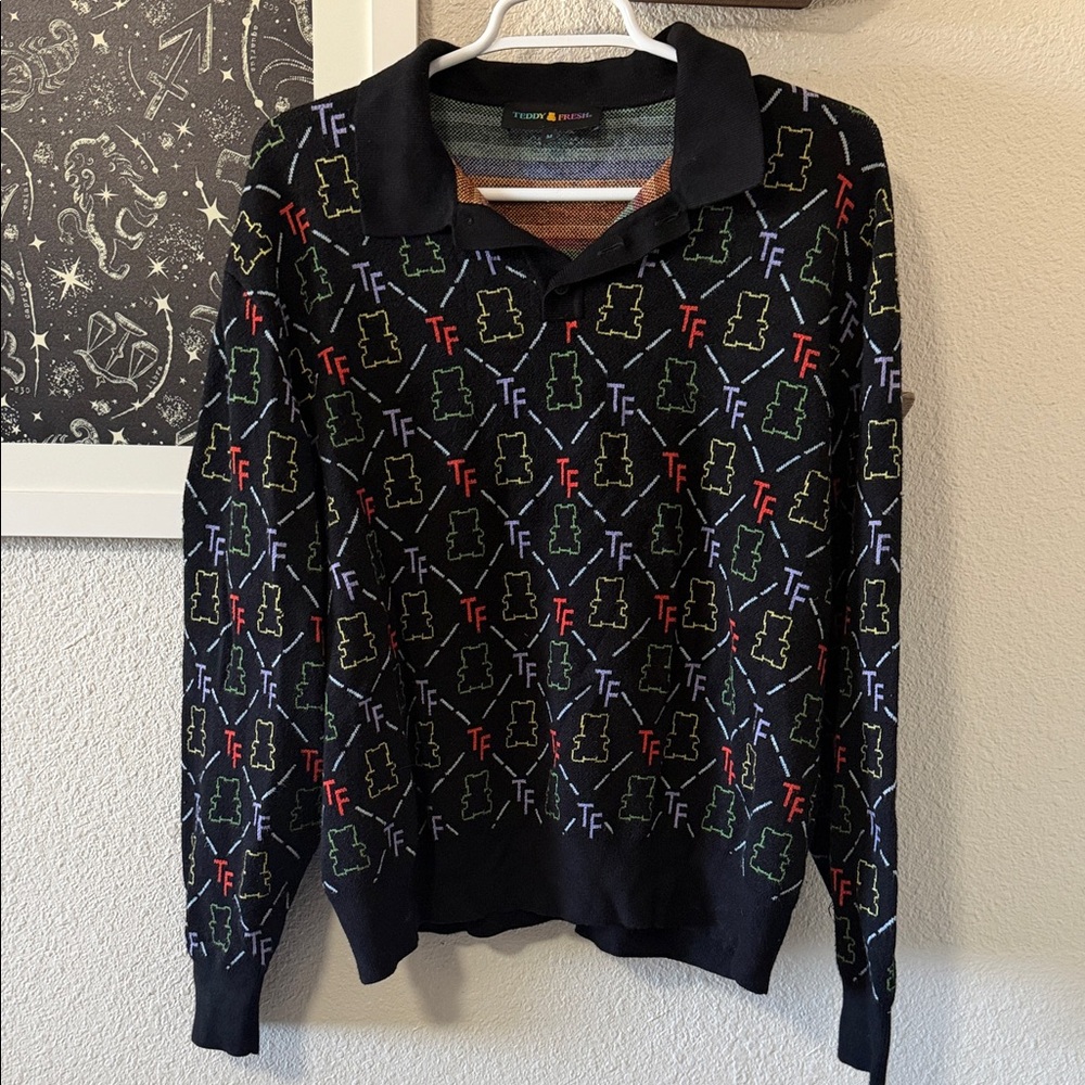 Teddy Fresh Black V-Neck Sweater with Multicolor Logo Pattern